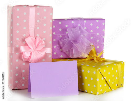 Photo: Gift boxes with blank label isolated on white Gift boxes with blank label isolated on white