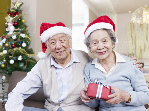 Photo: Senior Couple with Christmas hats Senior Couple with Christmas hats