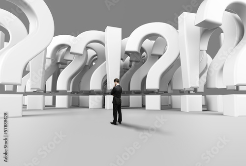 Photo: businessman standing and thinking businessman standing and thinking