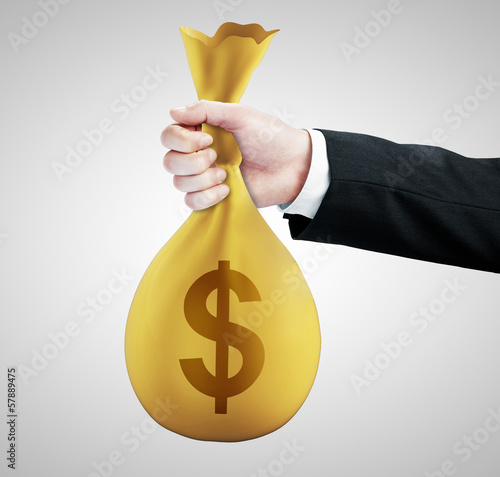 Photo: hand handing money pack hand handing money pack