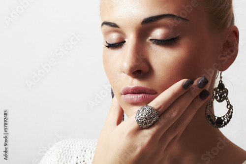 Photo: beautiful blond woman.Jewelry and Beauty.liquid sand manicure beautiful blond woman.Jewelry and Beauty.liquid sand manicure