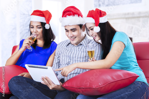 Photo: Xmas teenager drinking champagne Xmas teenager drinking champagne