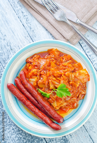 Photo: sausages with fried cabbage sausages with fried cabbage