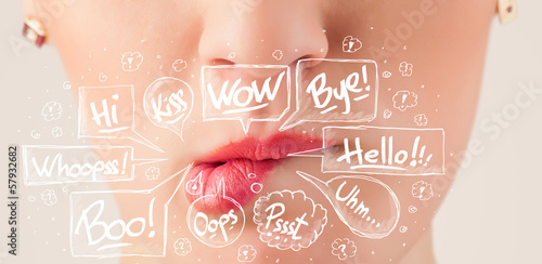Photo: Beautiful red lips with white speech bubbles Beautiful red lips with white speech bubbles
