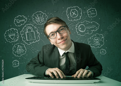 Photo: Young nerd hacker with virus and hacking thoughts Young nerd hacker with virus and hacking thoughts