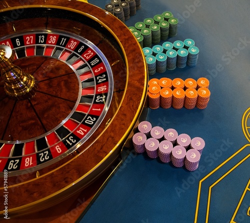 Photo: Gambling table with roulette in casino Gambling table with roulette in casino