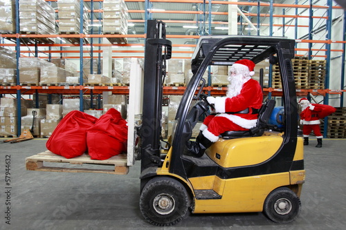 Photo: Rush hours in storehouse before Christmas time Rush hours in storehouse before Christmas time