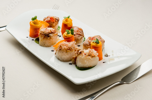 Photo: Delightful dish with fish fillet and carrot with pumpkin sauce Delightful dish with fish fillet and carrot with pumpkin sauce