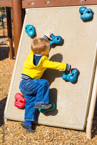 Photo: Toddler climbing Toddler climbing