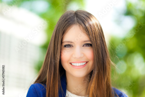 Photo: Smiling businesswoman outdoor Smiling businesswoman outdoor