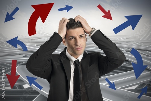 Photo: Confused way of a businessman Confused way of a businessman