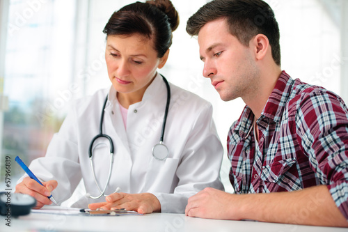 Photo: Doctor and patient Doctor and patient