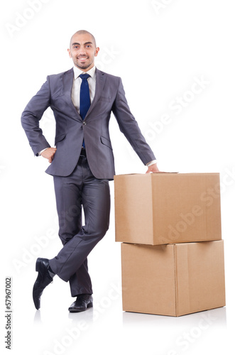 Photo: Businessman with box isolated on the white Businessman with box isolated on the white