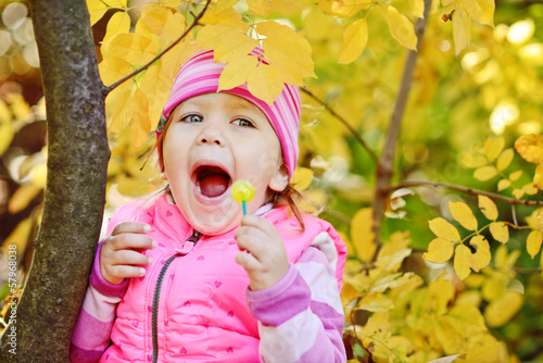 Photo: happy child with lollipop happy child with lollipop