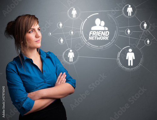 Photo: Attractive girl looking at modern social network Attractive girl looking at modern social network