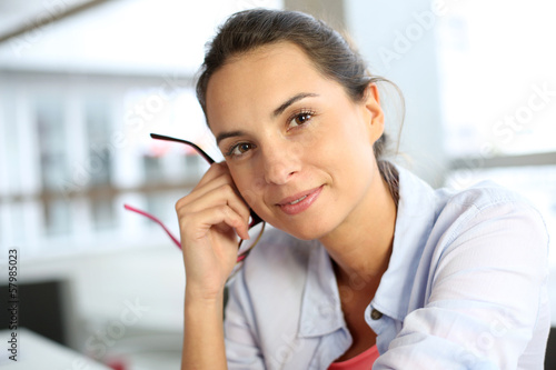 Photo: Young woman with satisfied look Young woman with satisfied look