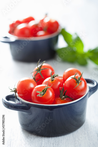 Photo: cherry tomatoes and basil in casserole cherry tomatoes and basil in casserole