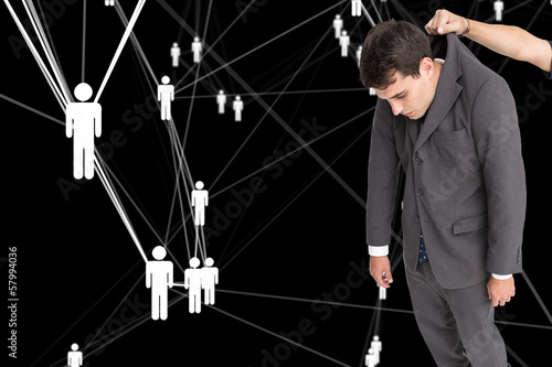 Photo: Composite image of businessman hanging Composite image of businessman hanging