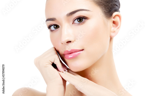 Photo: Beautiful girl with clean fresh skin, white background Beautiful girl with clean fresh skin, white background