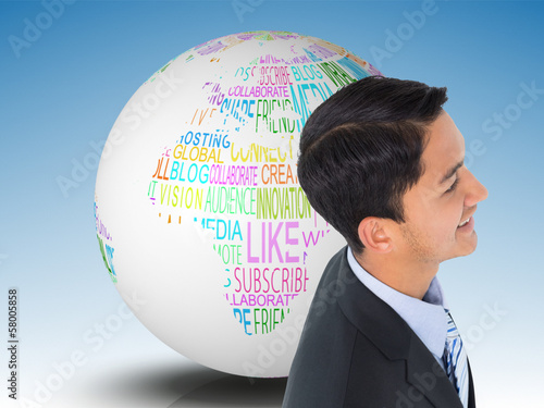Photo: Composite image of smiling asian businessman Composite image of smiling asian businessman