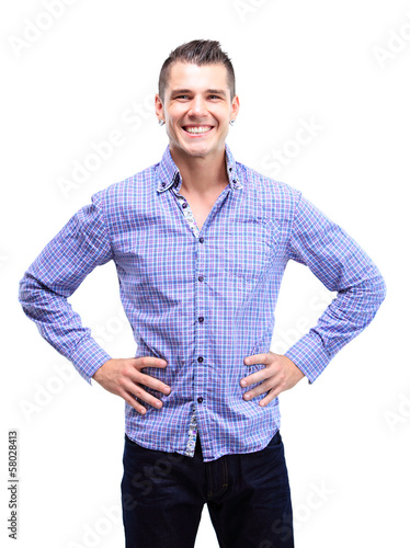 Photo: Casual young man looking at camera Casual young man looking at camera