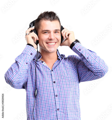 Photo: young man in headphones young man in headphones