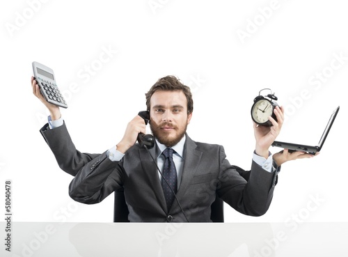 Photo: Businessman multitasking Businessman multitasking