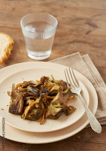 Photo: Dish of sauteed artichokes and yellow foot mushrooms Dish of sauteed artichokes and yellow foot mushrooms