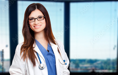 Photo: Female doctor in her studio Female doctor in her studio