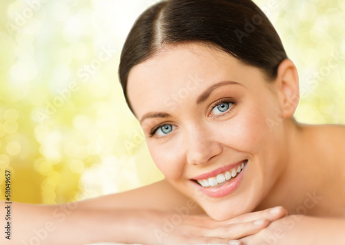 Photo: beautiful smiling woman in spa salon beautiful smiling woman in spa salon