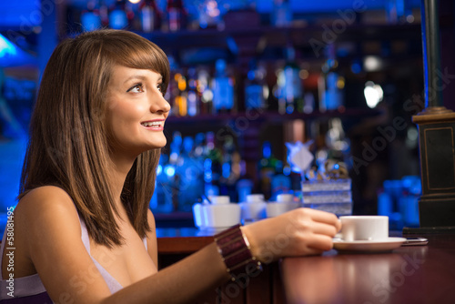 Photo: woman with a cup of coffee woman with a cup of coffee