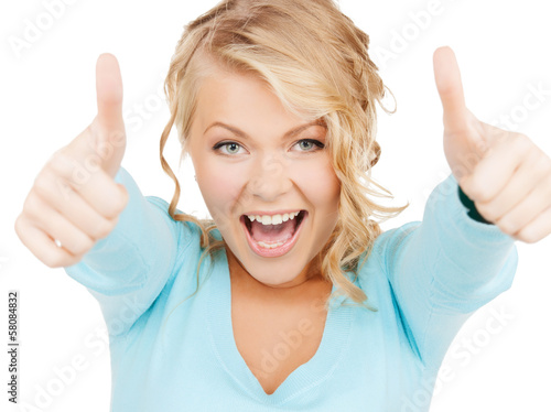 Photo: young businesswoman with thumbs up young businesswoman with thumbs up