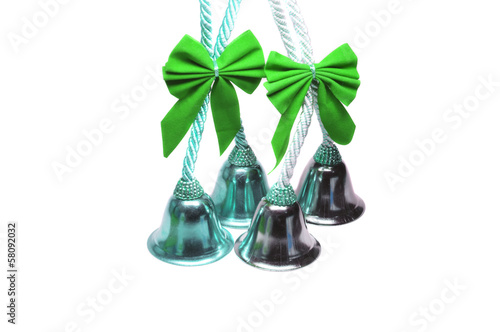Photo: Four real christmas bells with green ribbon Four real christmas bells with green ribbon