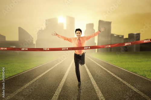 Photo: Businessman winning the business competition Businessman winning the business competition