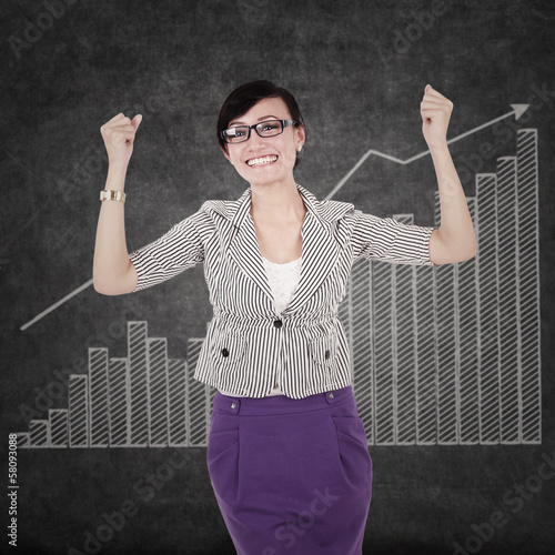 Photo: Successful businesswoman with chart Successful businesswoman with chart