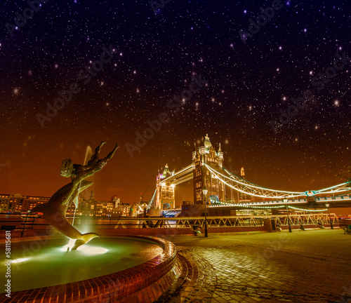 Photo: Tower Bridge and St Katharine Docks Girl with a dolpin fountain Tower Bridge and St Katharine Docks Girl with a dolpin fountain