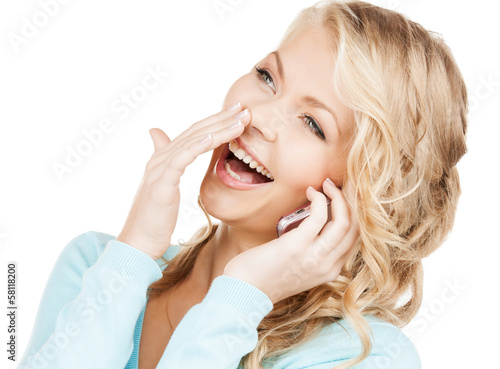 Photo: businesswoman with cell phone calling businesswoman with cell phone calling