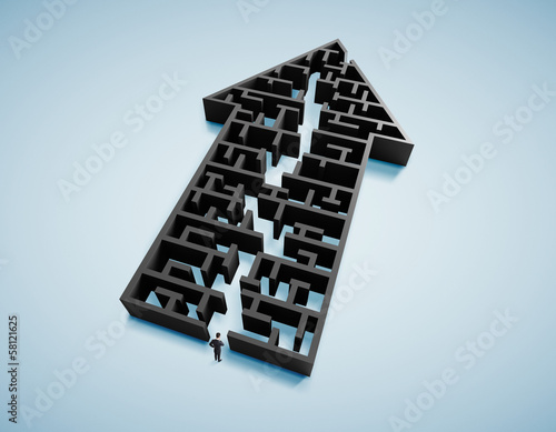Photo: businessman and arrow form labyrinth businessman and arrow form labyrinth