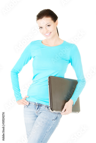 Photo: Attractive woman with a laptop. Attractive woman with a laptop.