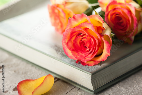 Photo: roses on a book roses on a book