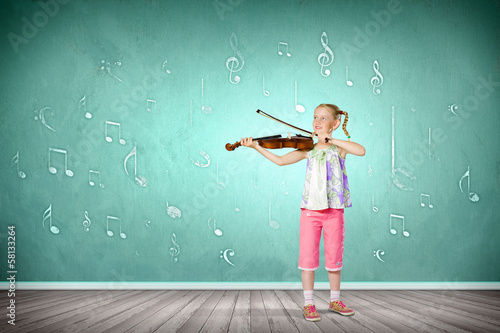Photo: Girl playing violin Girl playing violin