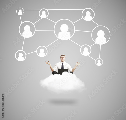 Photo: businessman meditate on cloud businessman meditate on cloud