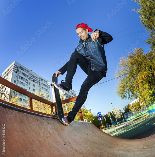 Photo: Skateboarder in the skatepark Skateboarder in the skatepark