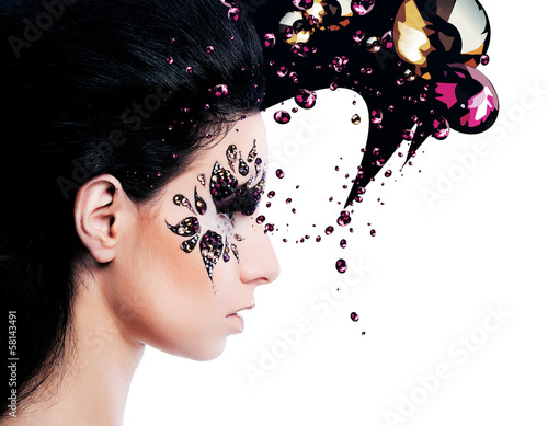Photo: woman and face art with a lot of rhinestones woman and face art with a lot of rhinestones