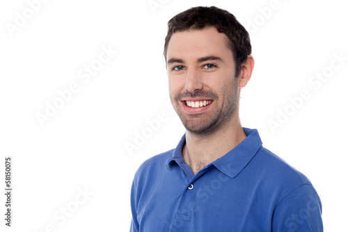 Photo: Casual shot of a young smiling man Casual shot of a young smiling man