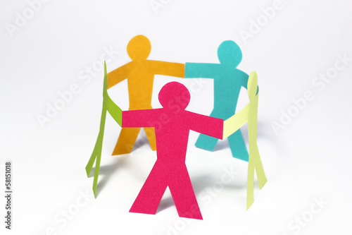 Photo: circle of colorful paper people on white background circle of colorful paper people on white background