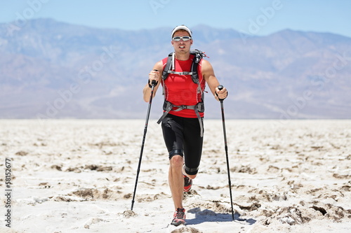 Photo: Ultra running man - trail runner in extreme race Ultra running man - trail runner in extreme race