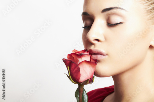 Photo: beautiful woman with rose beautiful woman with rose