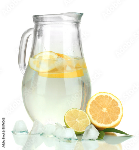 Photo: Cold water with lime, lemon and ice in pitcher isolated on Cold water with lime, lemon and ice in pitcher isolated on