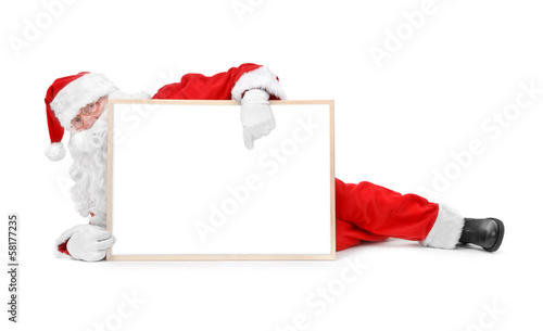 Photo: Santa and empty white board Santa and empty white board